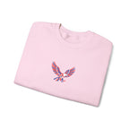 Folded pink sweatshirt with an eagle emblem on a white background