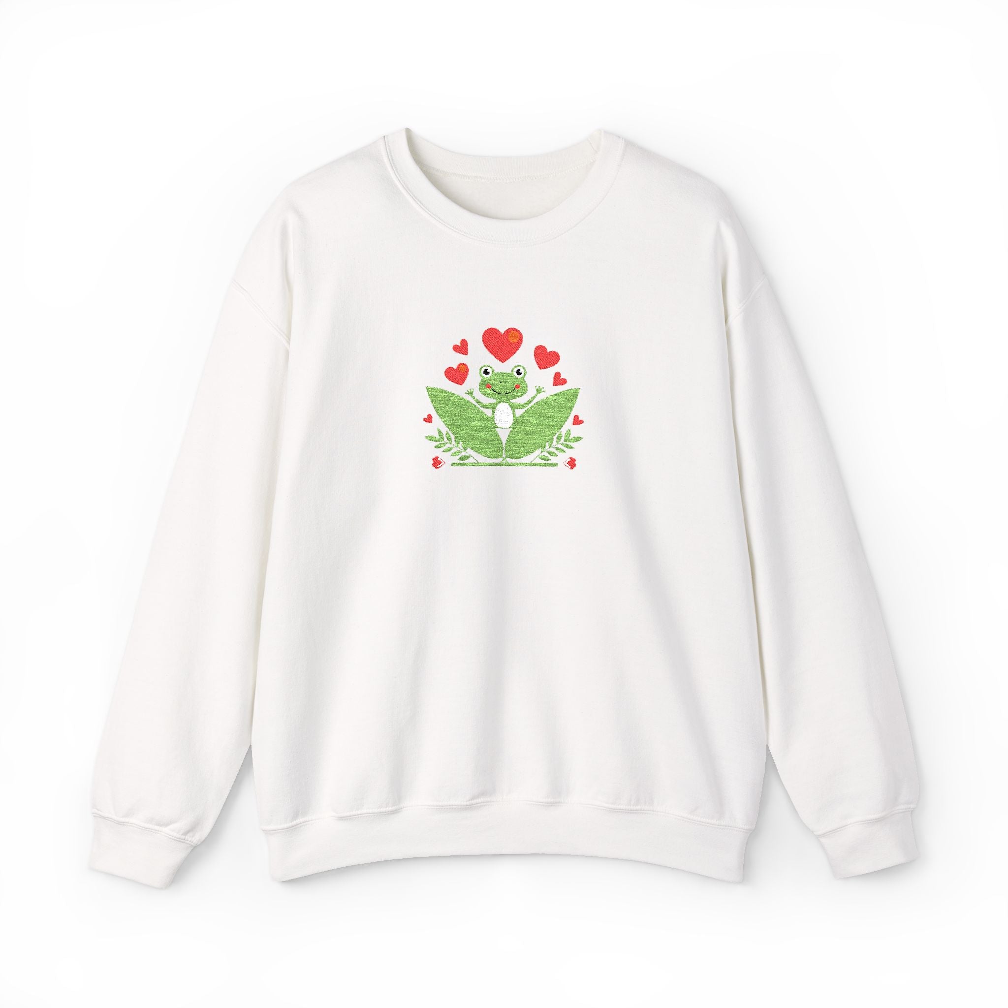 White sweatshirt with a green frog and red hearts design on a white background