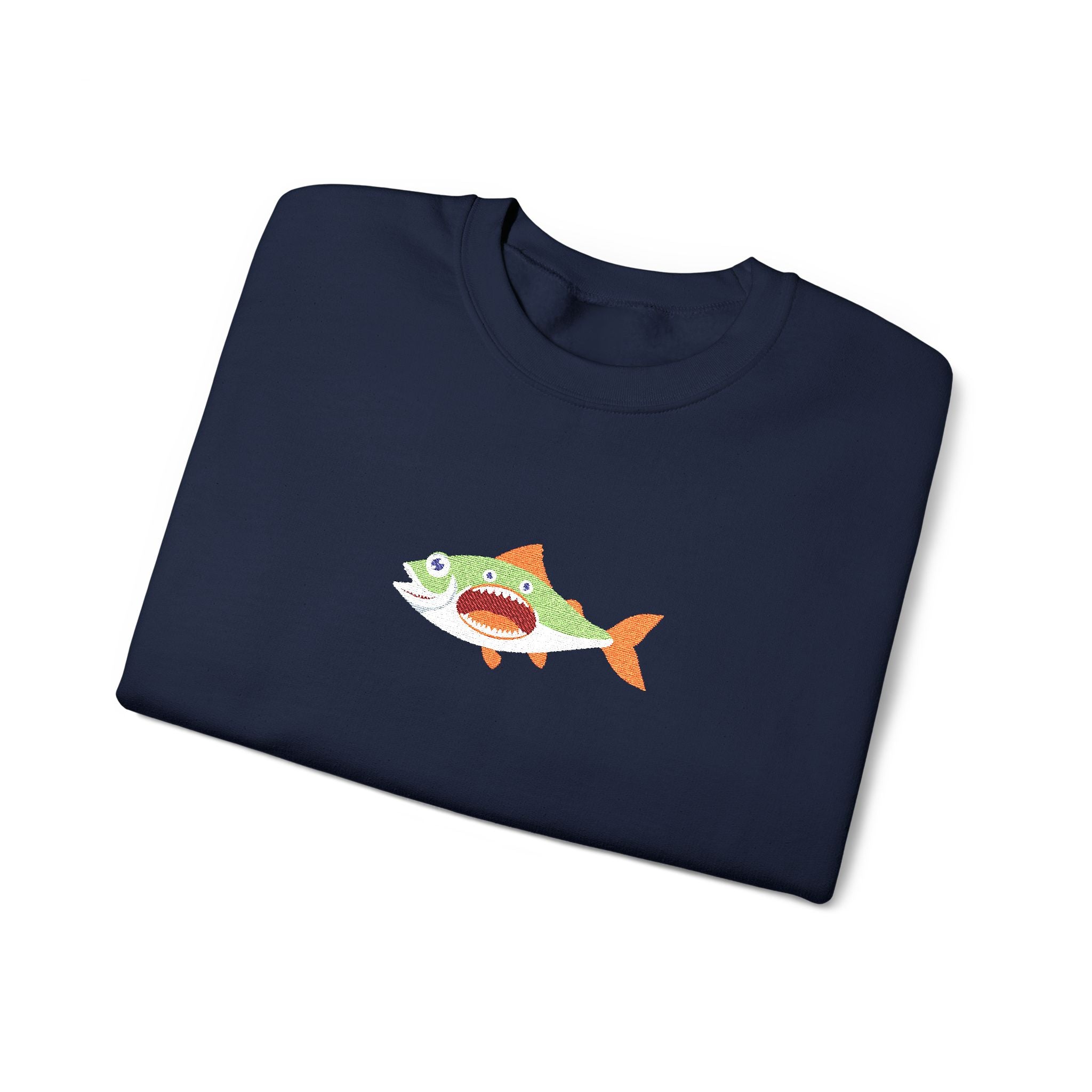 Folded dark gray t-shirt with a fish graphic on a white background