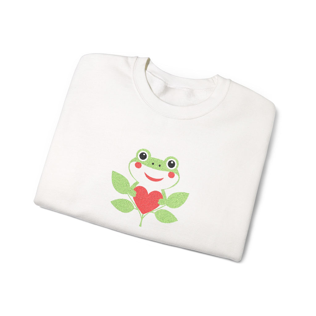 White sweatshirt with a frog holding a red heart design on a white background