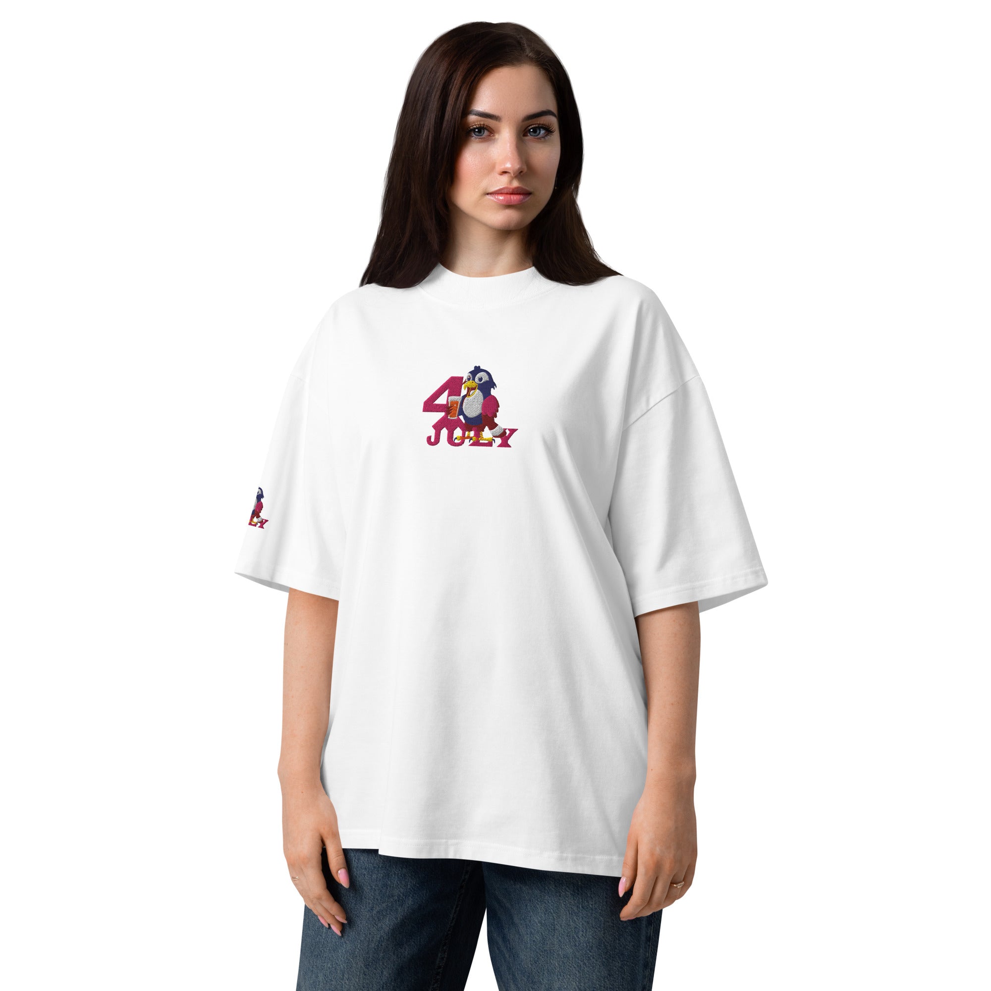Person wearing a white t-shirt with a graphic design on a white background