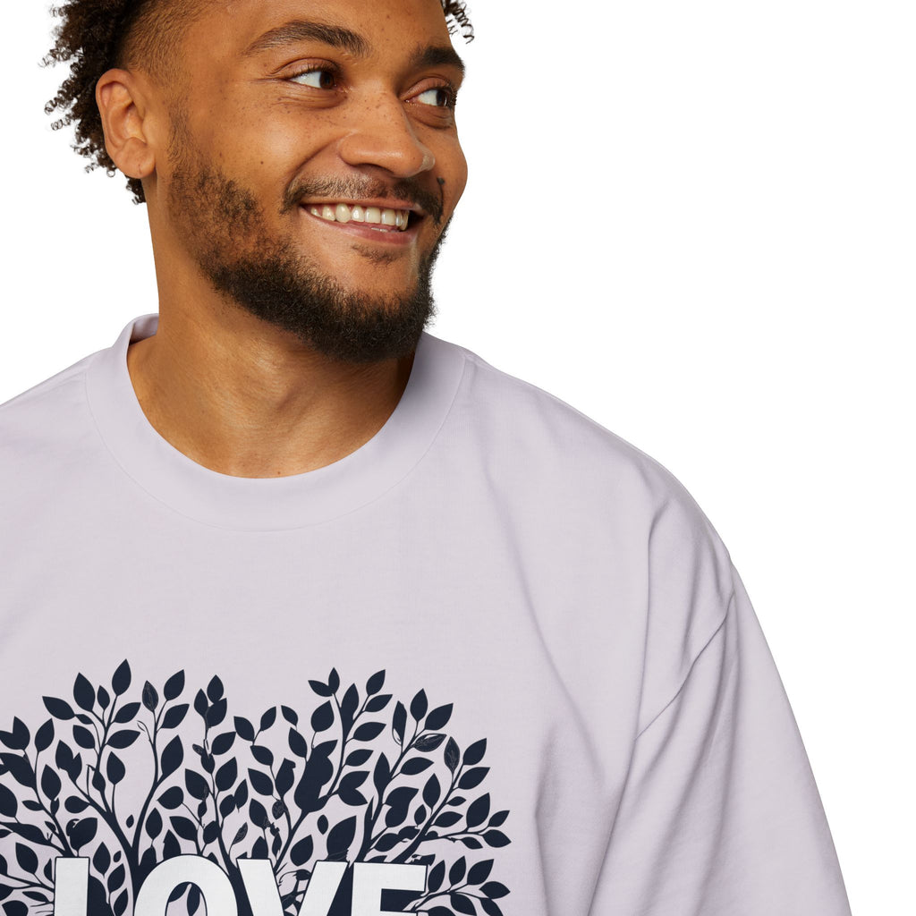 Man wearing a light gray sweatshirt with a leaf design and 'LOVE' text on a white background