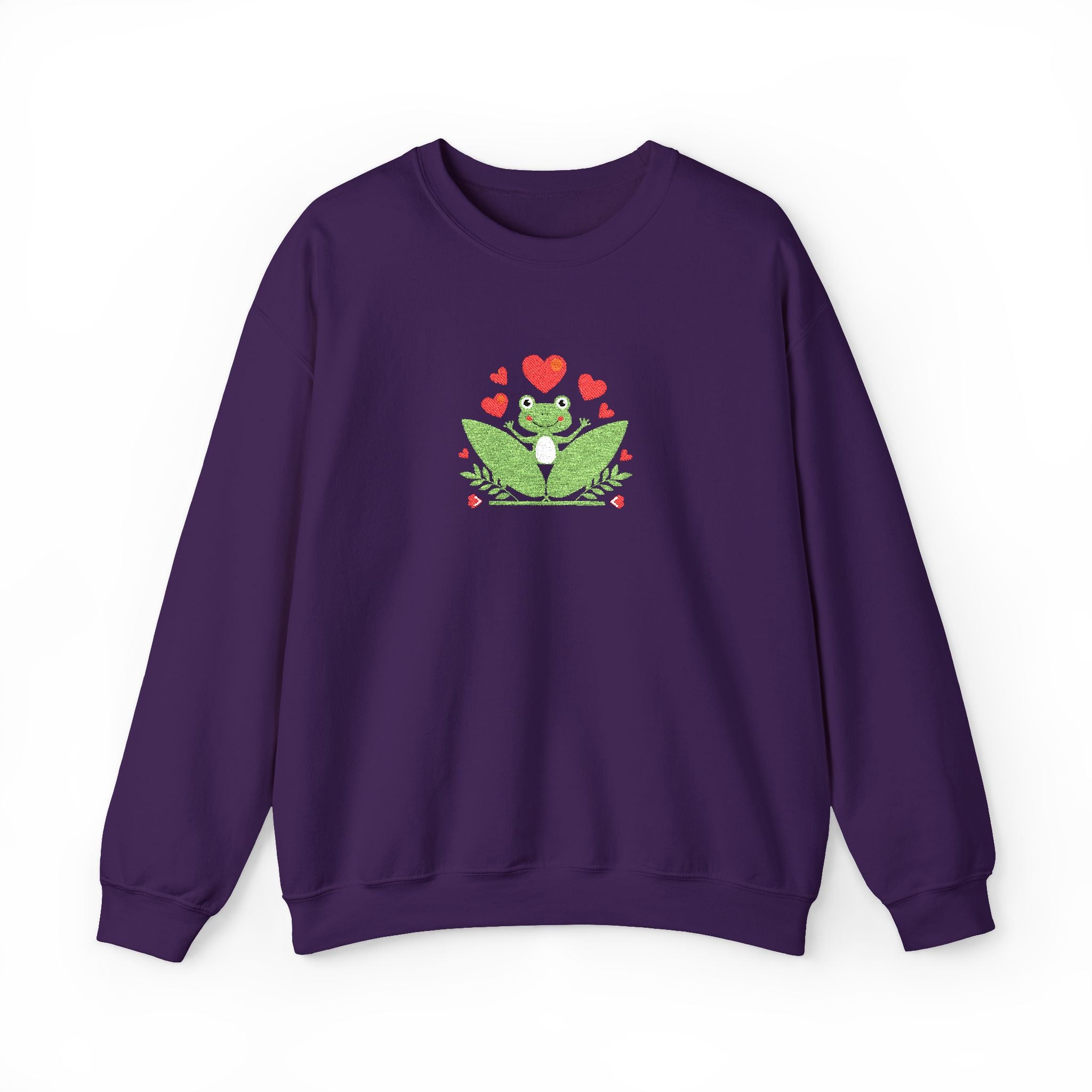 Purple sweatshirt with a green frog graphic and red hearts on a white background