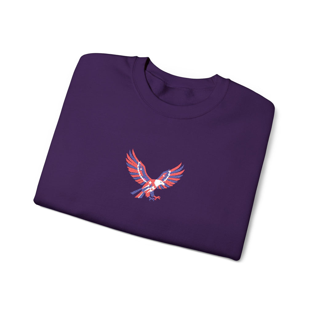 Folded navy blue shirt with a red and white eagle design on a white background