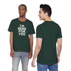Two people wearing a green t-shirt with 'I'm Here For You' text, one facing front and one facing back.