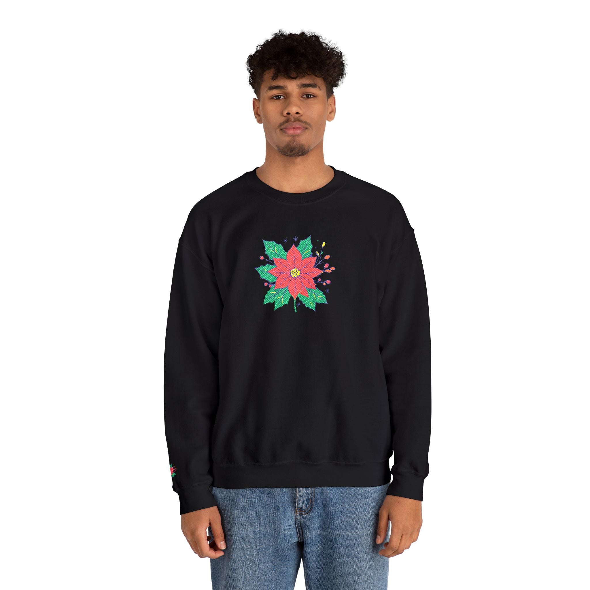 Person wearing a black sweatshirt with a colorful flower design on a white background