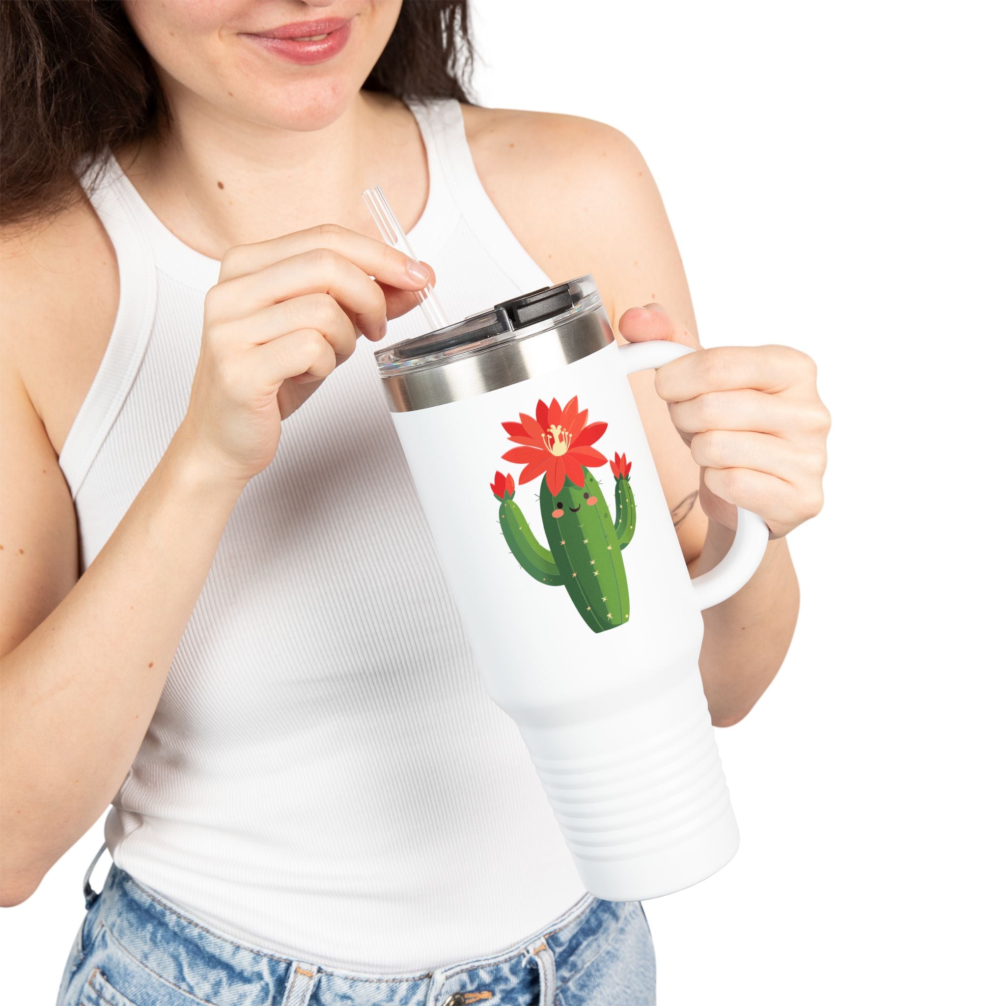 Person holding a white mug with a cactus design on a white background
