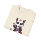 Folded t-shirt with a cat playing guitar graphic on a white background