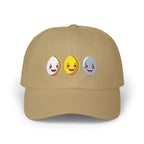 Beige cap with three colorful emoji faces on a white background