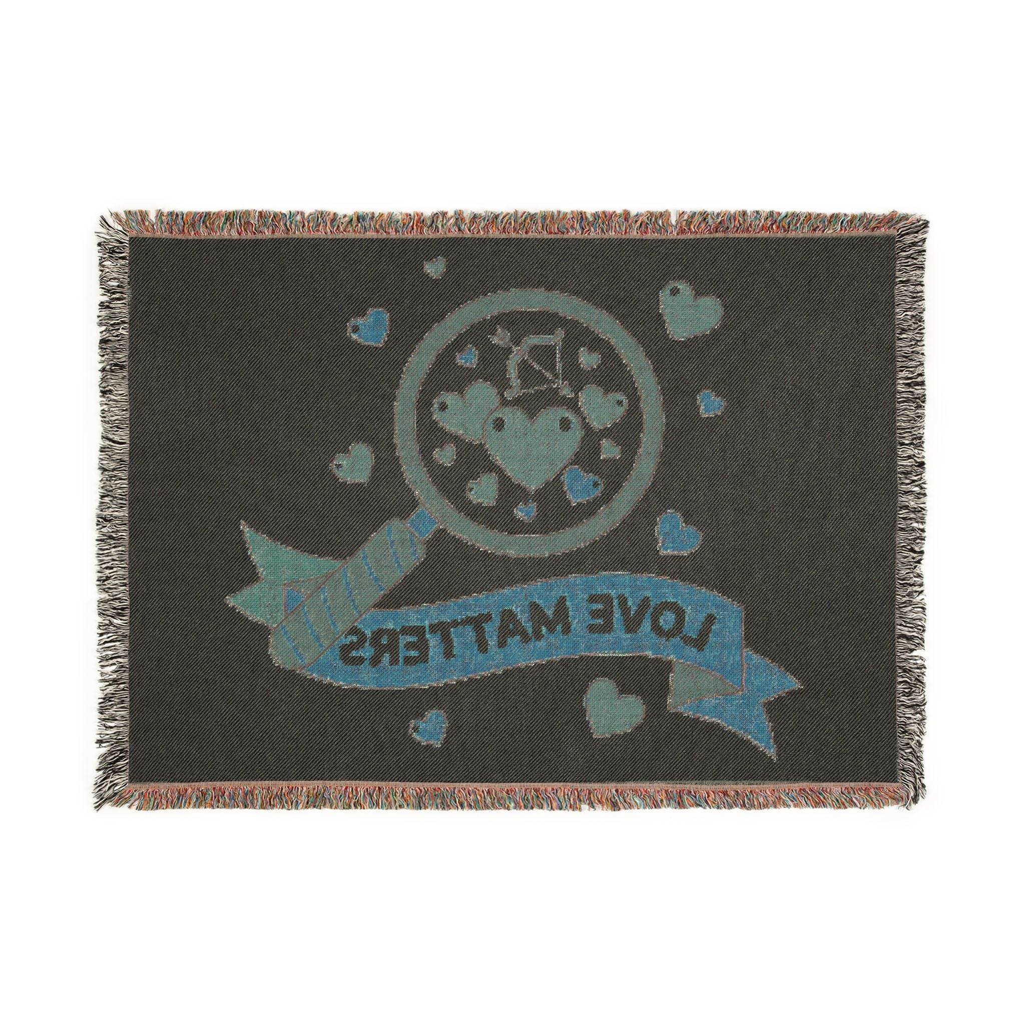Blanket with 'Love Matters' design on a white background