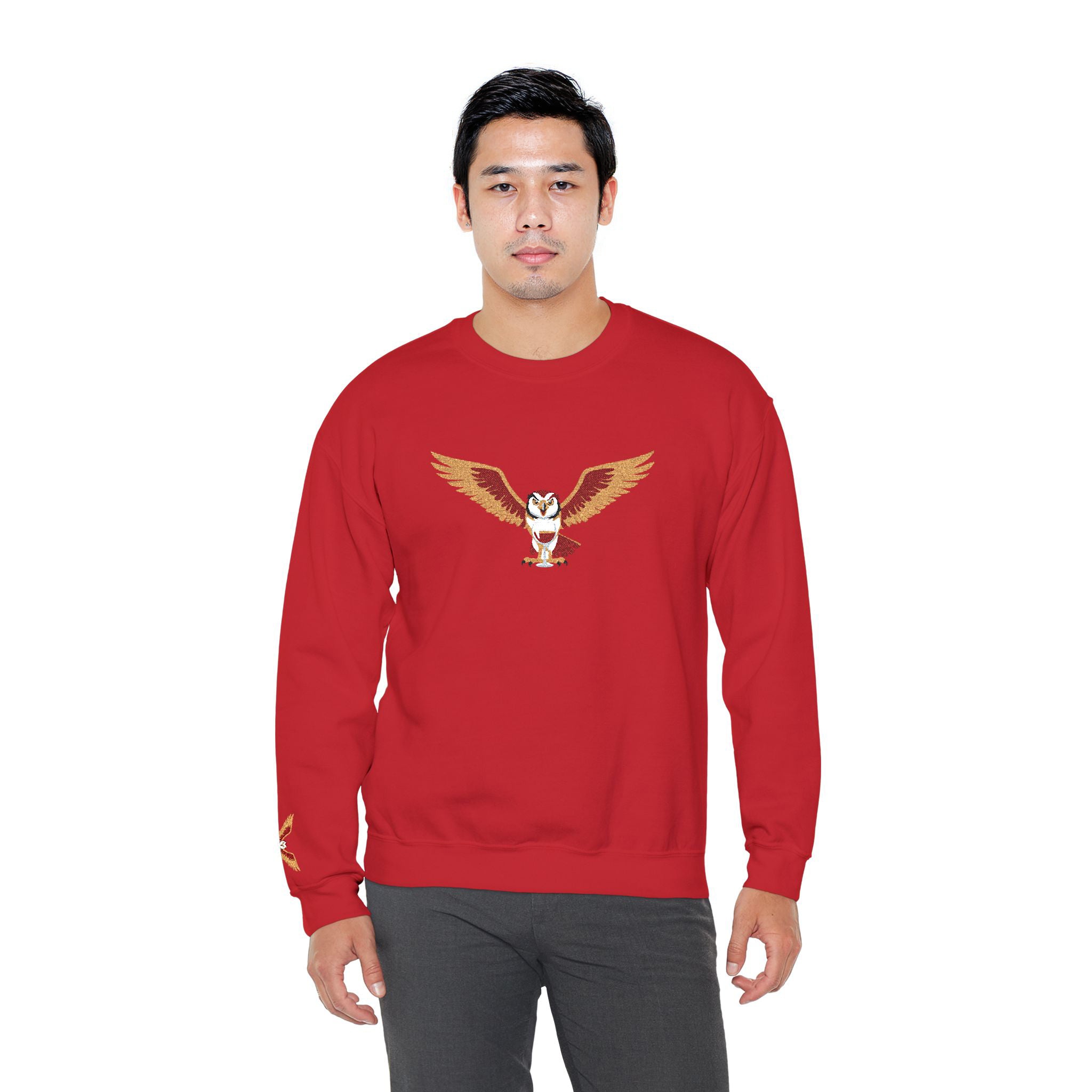 Person wearing a red sweatshirt with an eagle design on a white background