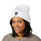 Person wearing a white beanie with a logo on a white background