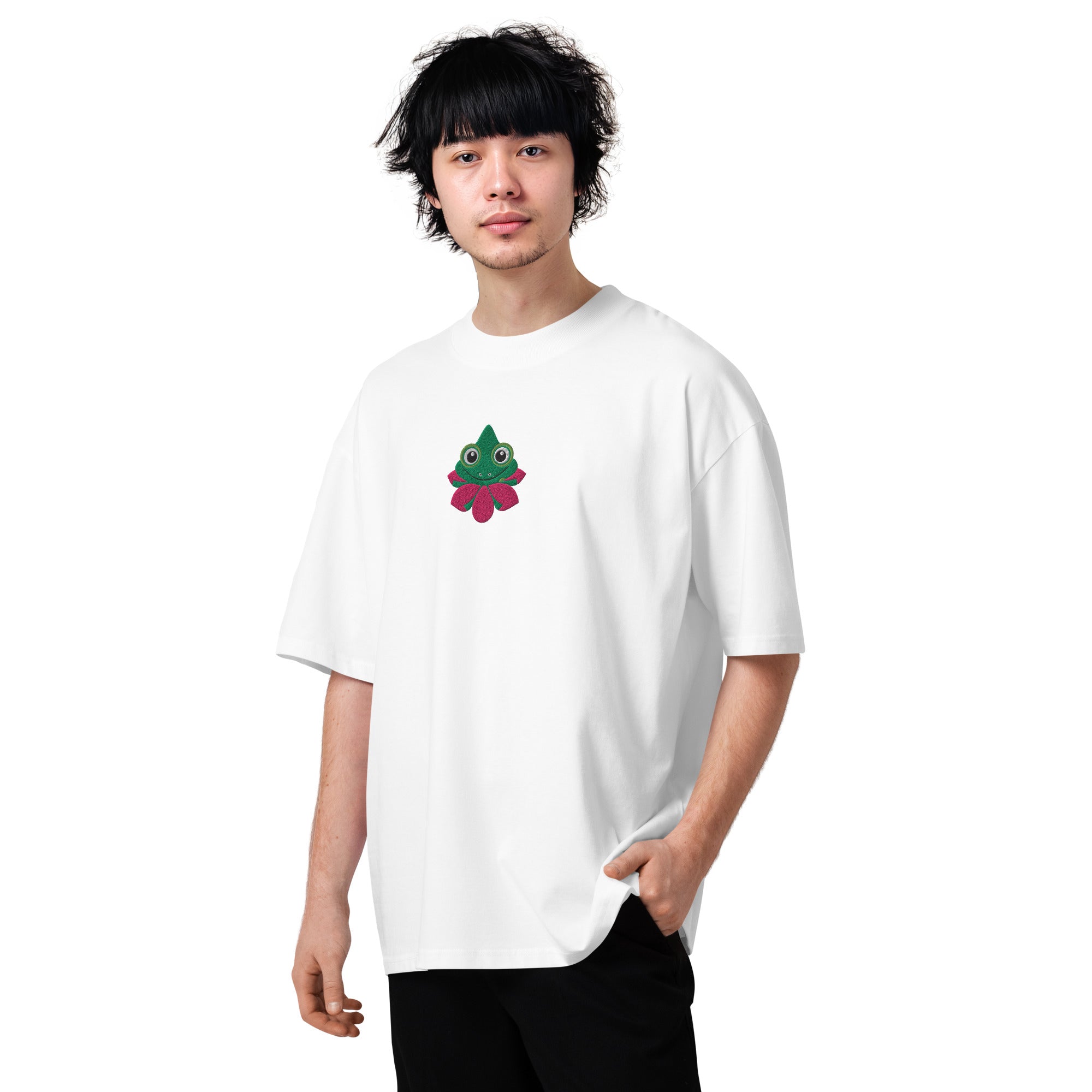 Person wearing a white t-shirt with a colorful graphic on a white background