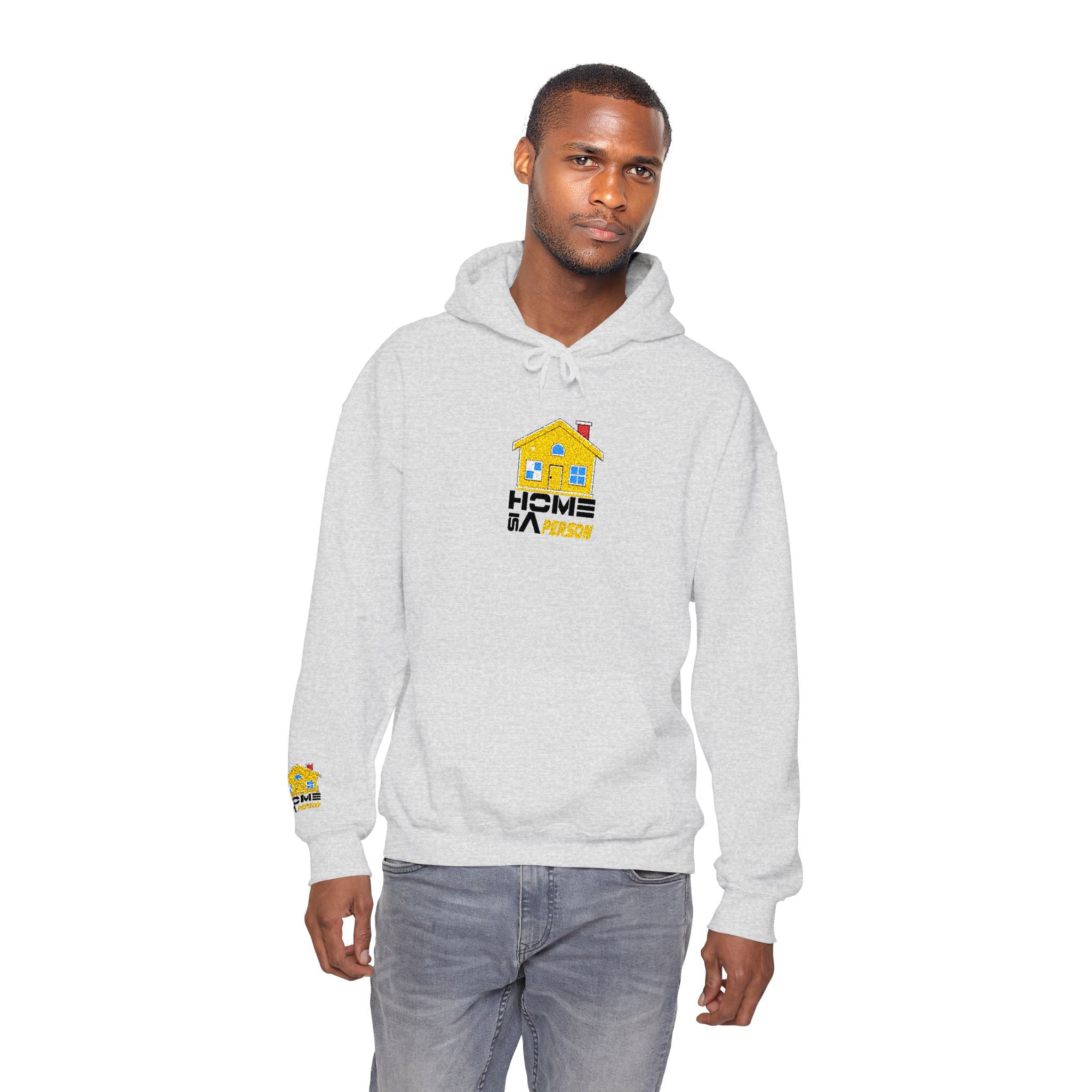 Man wearing a gray hoodie with a colorful logo on a white background