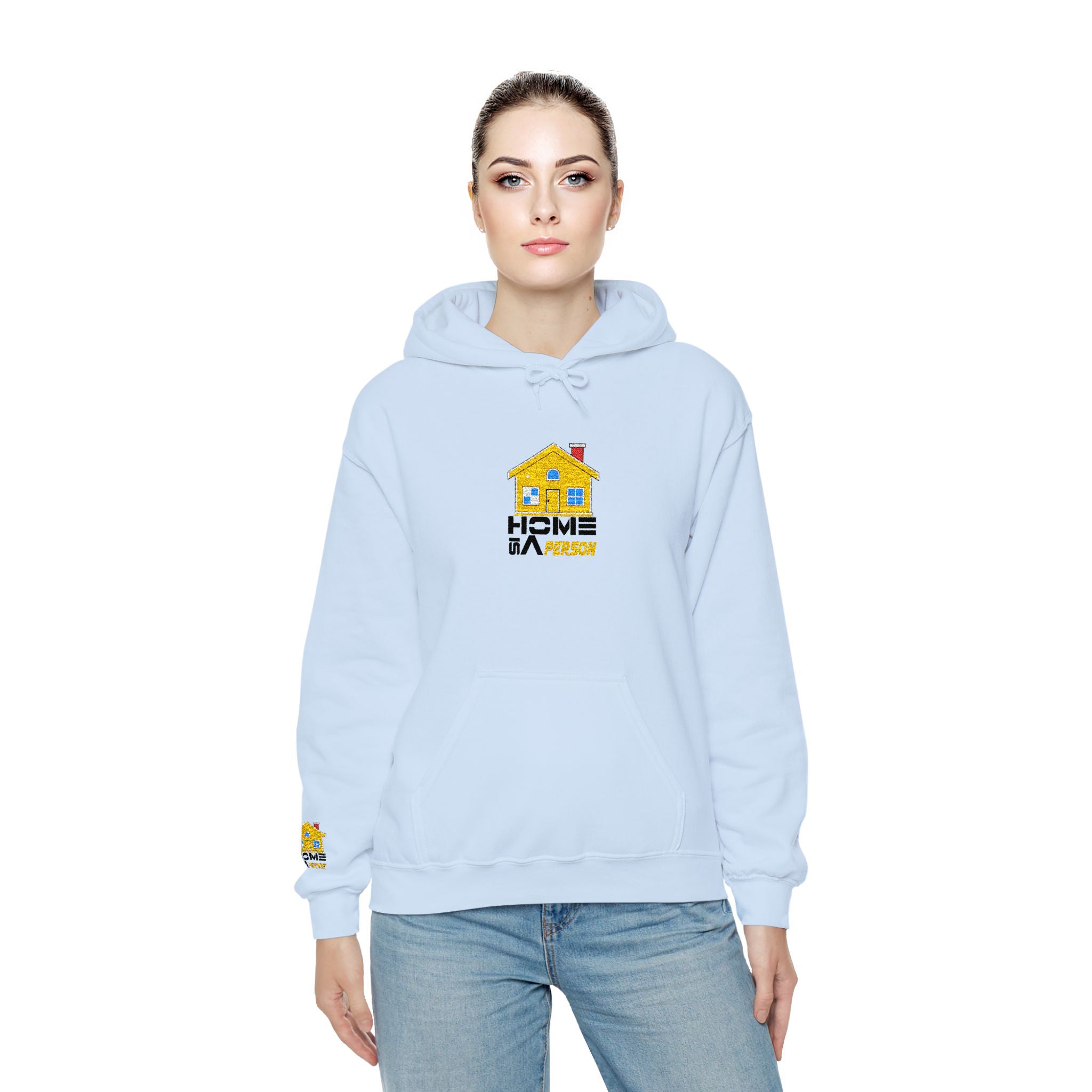 Woman wearing a light blue hoodie with a logo on a white background