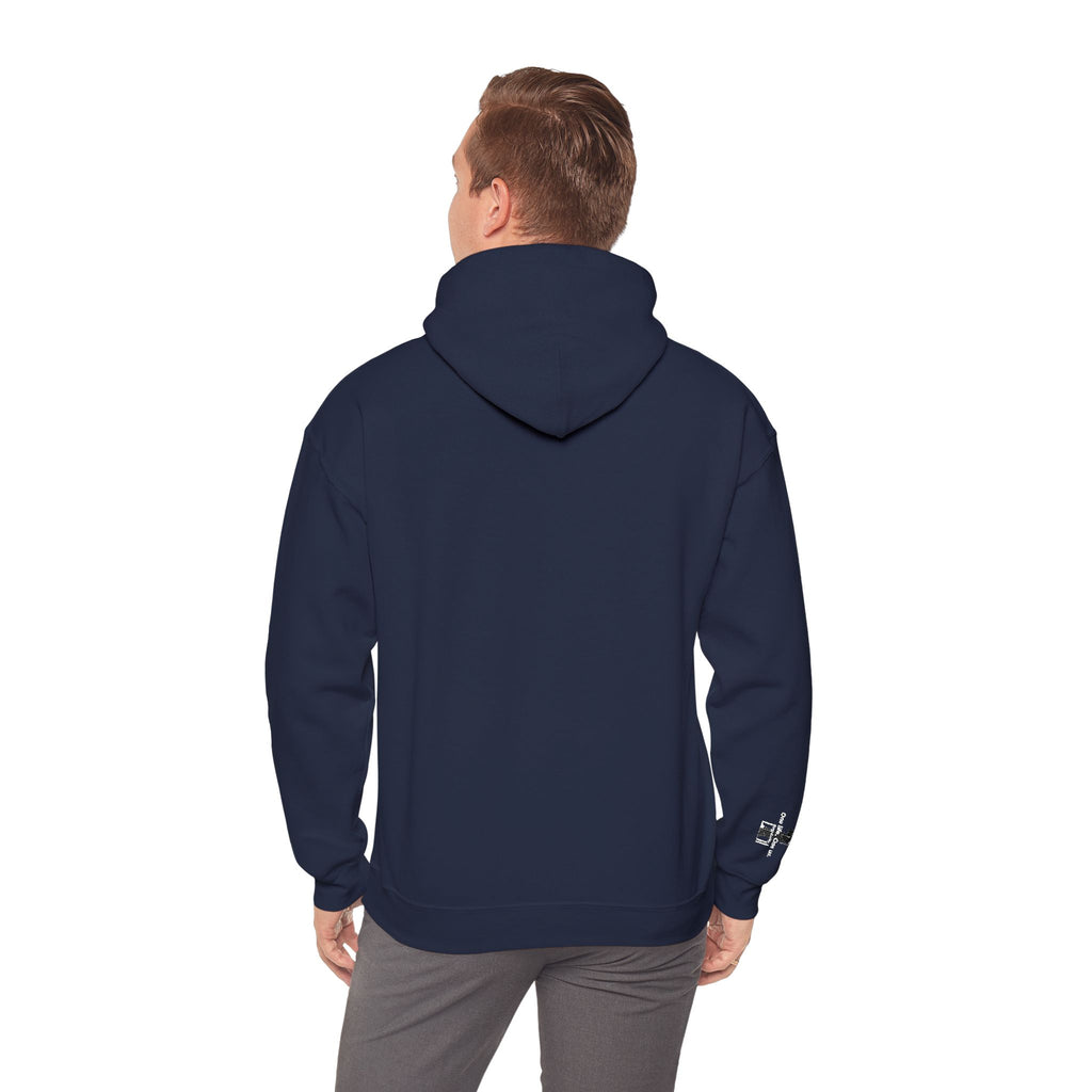 Person wearing a navy blue hoodie on a white background