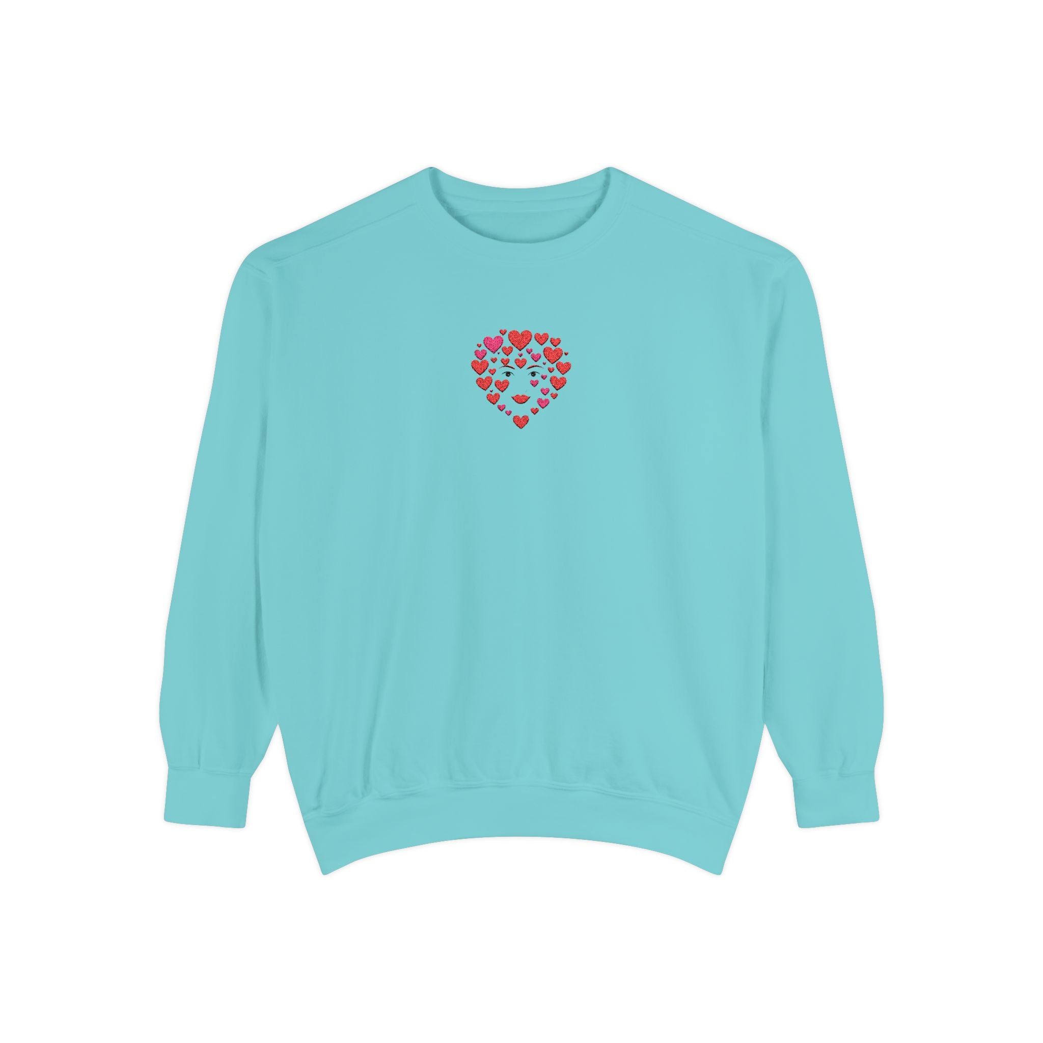 Light blue sweatshirt with a red heart pattern on a white background