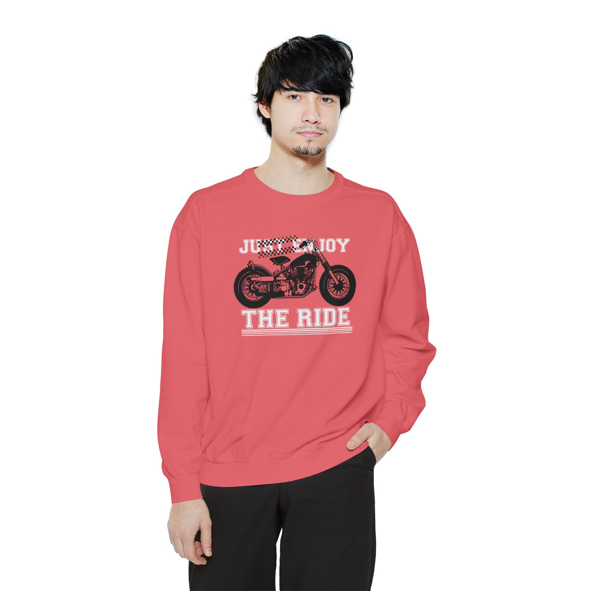 Person wearing a red sweatshirt with a graphic design and text on a white background
