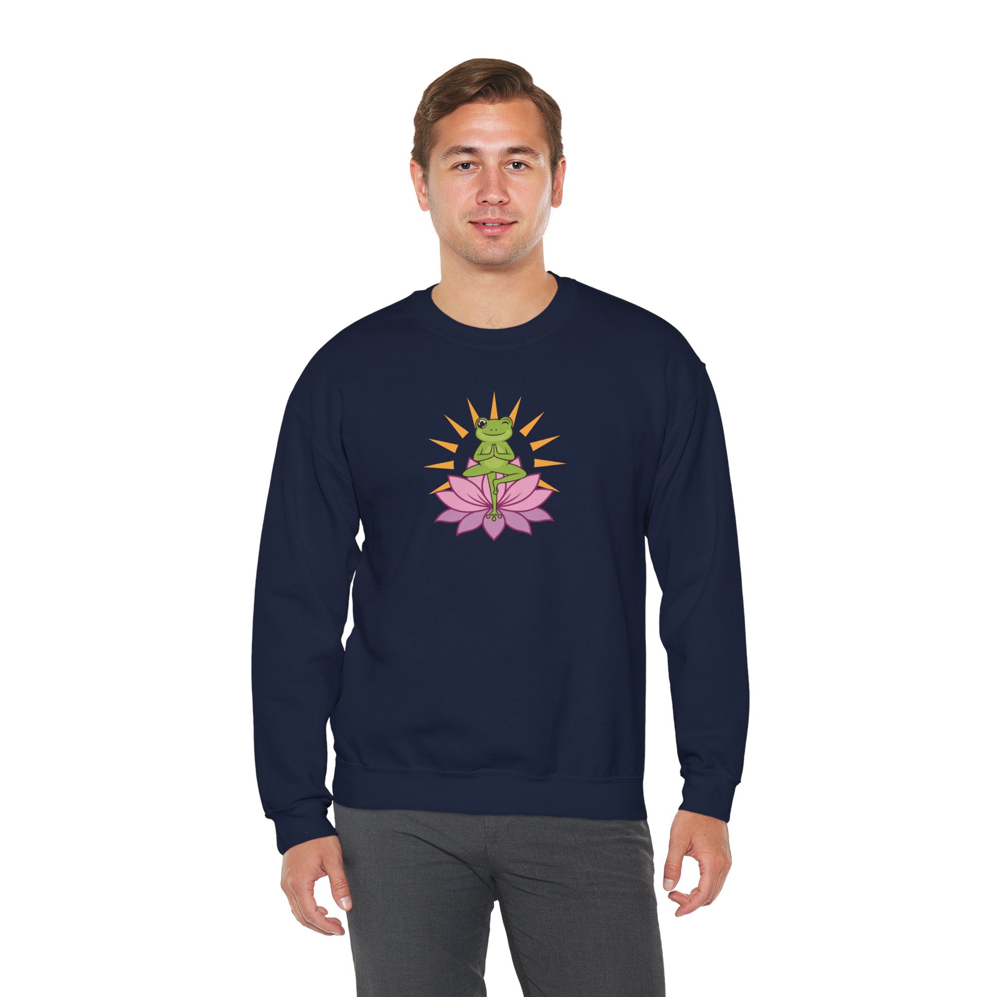 Man wearing a navy blue sweatshirt with a colorful design of a frog on a pink flower.
