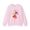 Pink sweatshirt with a colorful graphic of a woman on a white background