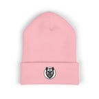 Pink beanie with a black and white logo on a white background