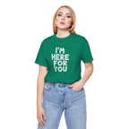 Person wearing a green t-shirt with 'I'm here for you' text on a white background