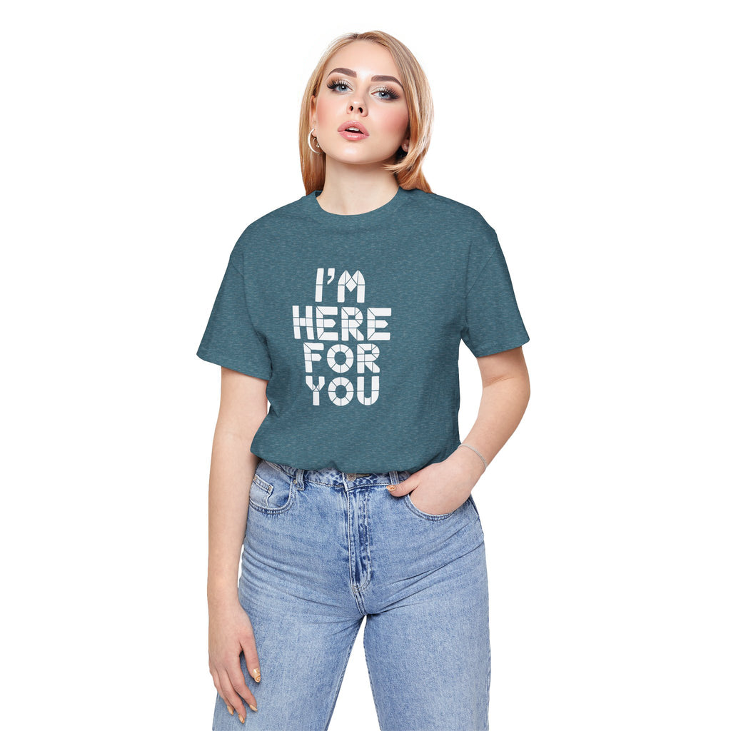 Person wearing a teal t-shirt with 'I'm here for you' text on a white background