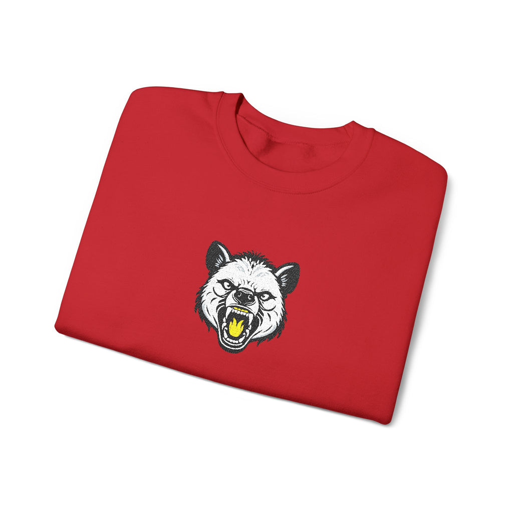 Folded red sweatshirt with a graphic of a bear's face on a white background