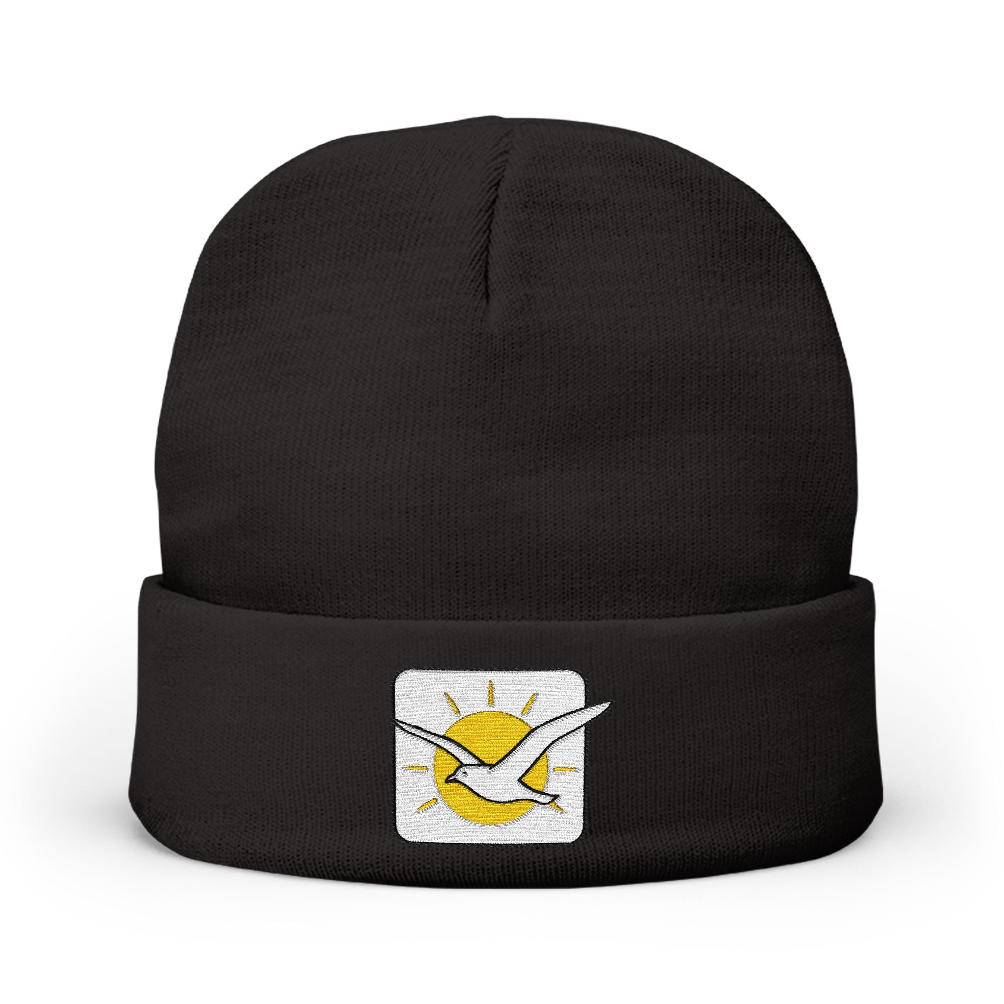 Black beanie with a logo featuring a bird and sun on a white background