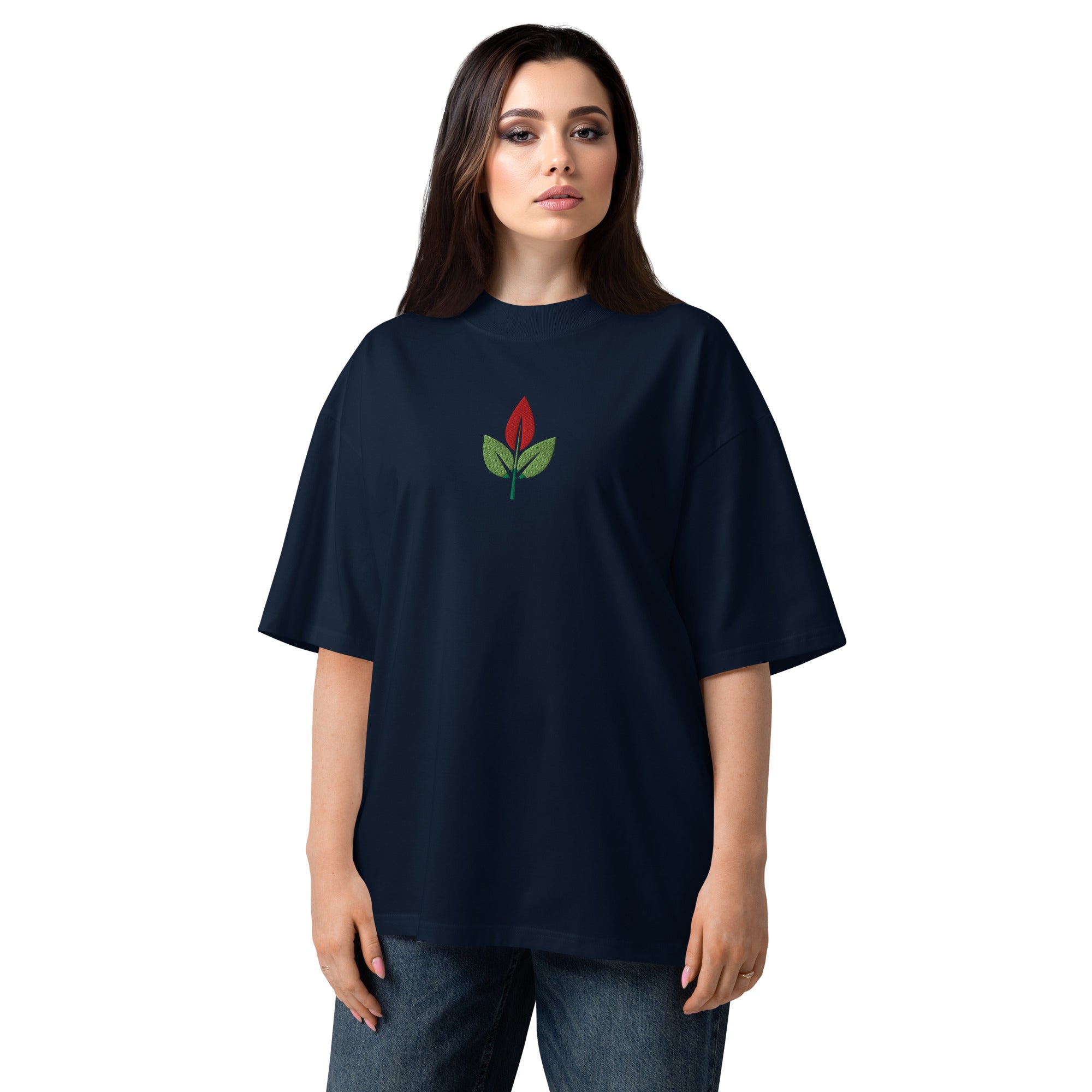 Person wearing a navy blue t-shirt with a red and green logo on a white background