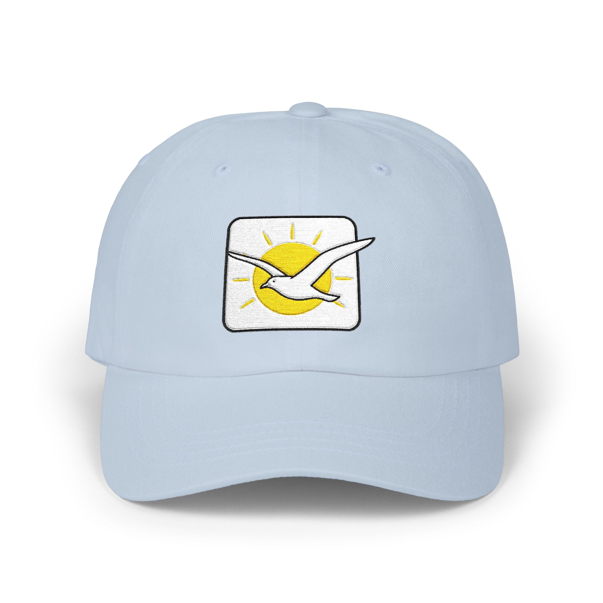 Light blue cap with a sun and bird design on a white background
