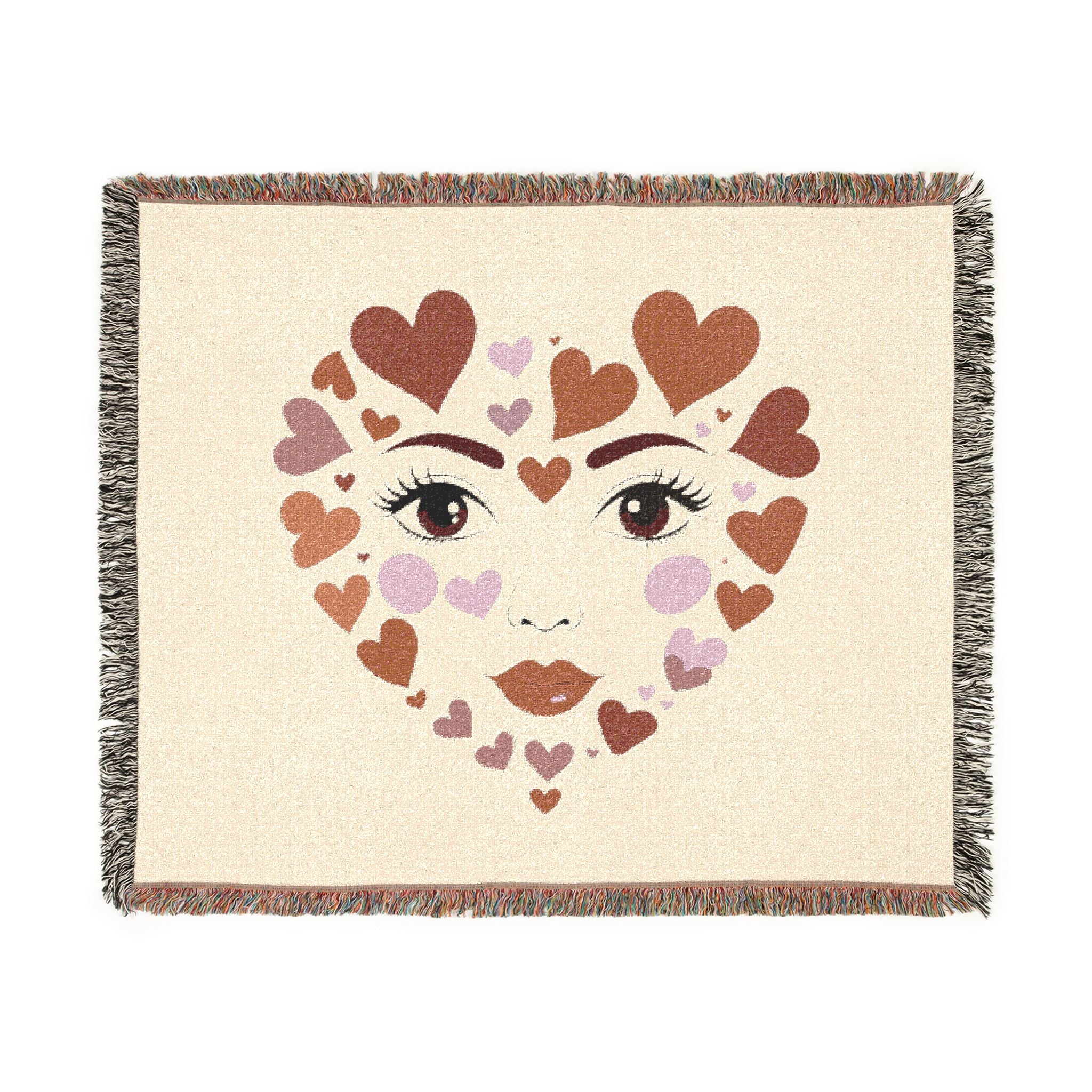 Blanket with heart-shaped face design on a beige background