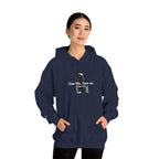 Person wearing a navy blue hoodie with text on a white background