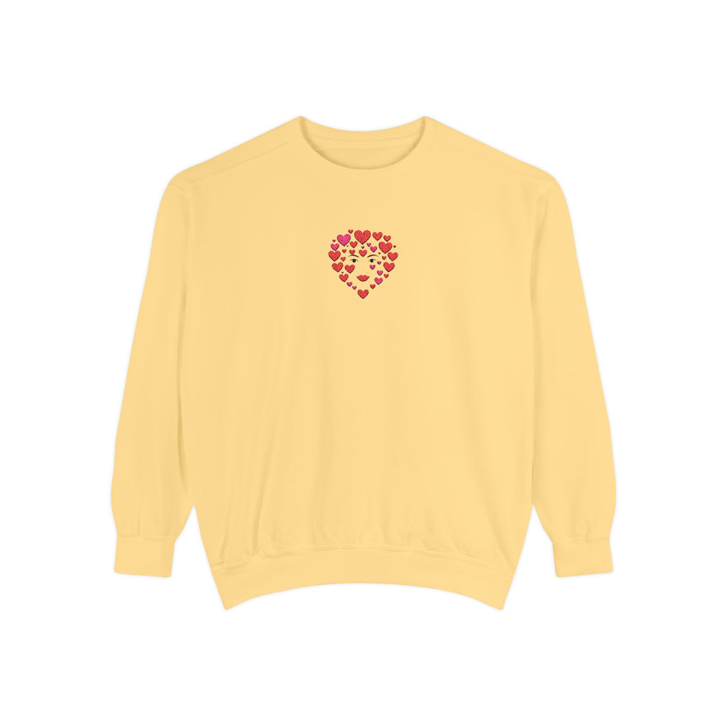 Yellow sweatshirt with a heart design on a white background
