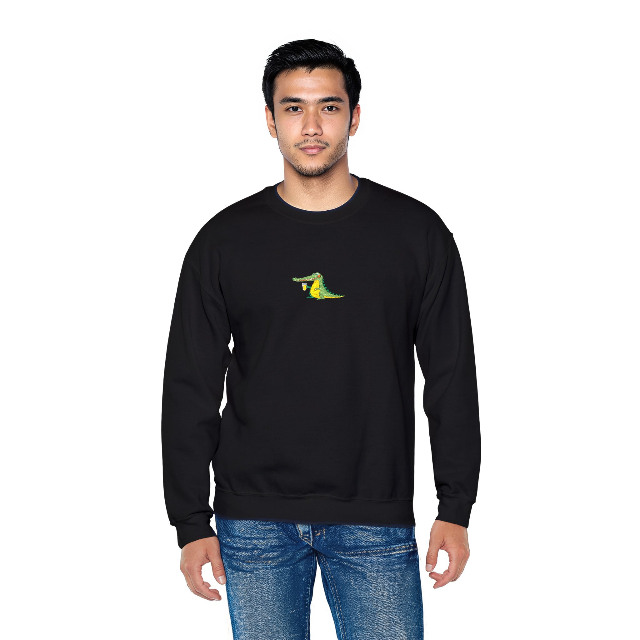 Man wearing a black sweatshirt with a small logo on a white background