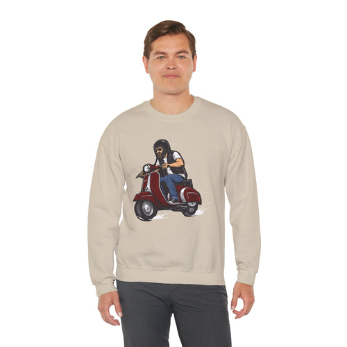 Man wearing a beige sweatshirt with a graphic design of a person on a scooter.