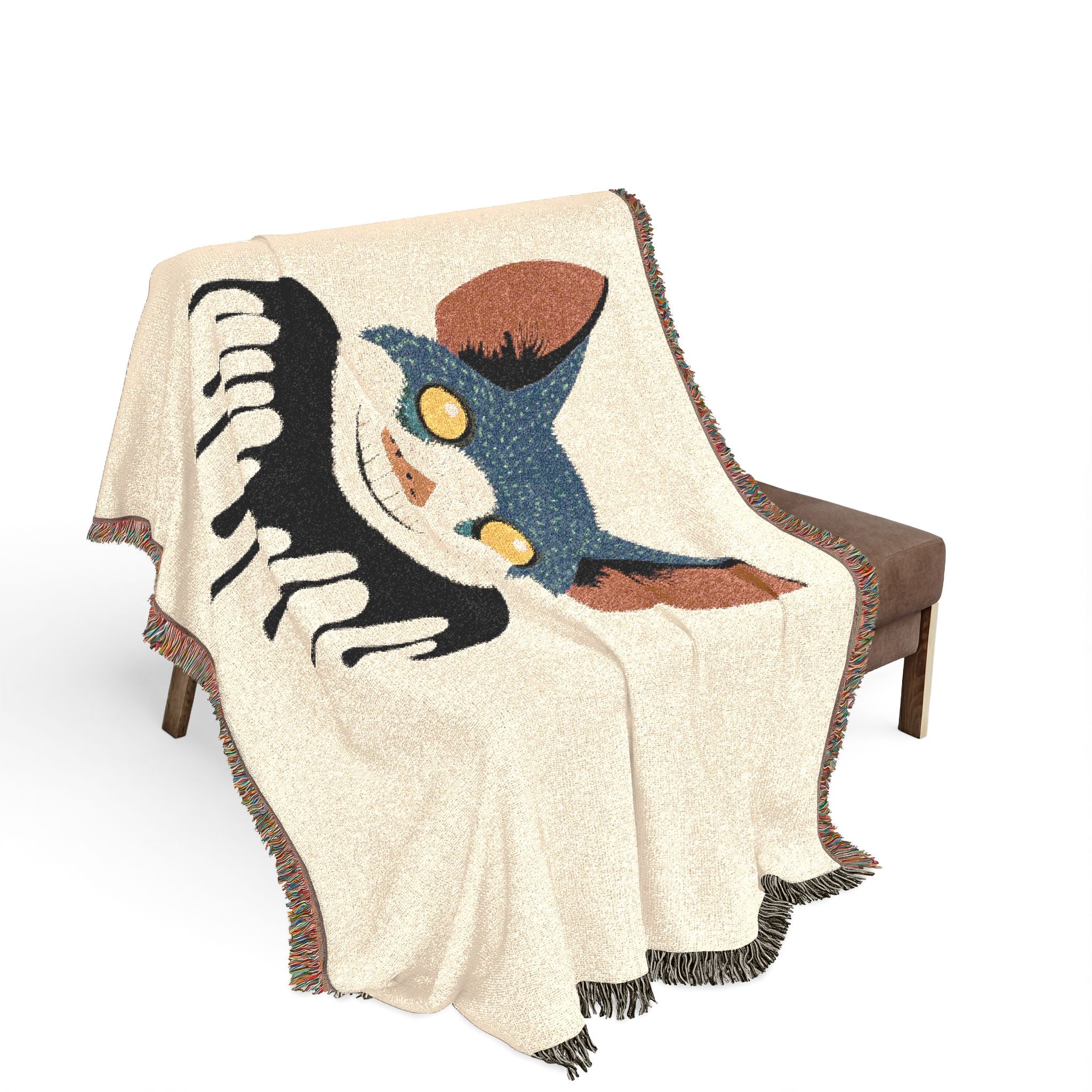Decorative blanket with a cartoon character draped over a chair on a white background