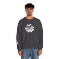 Person wearing a dark gray sweatshirt with a white floral design on a white background