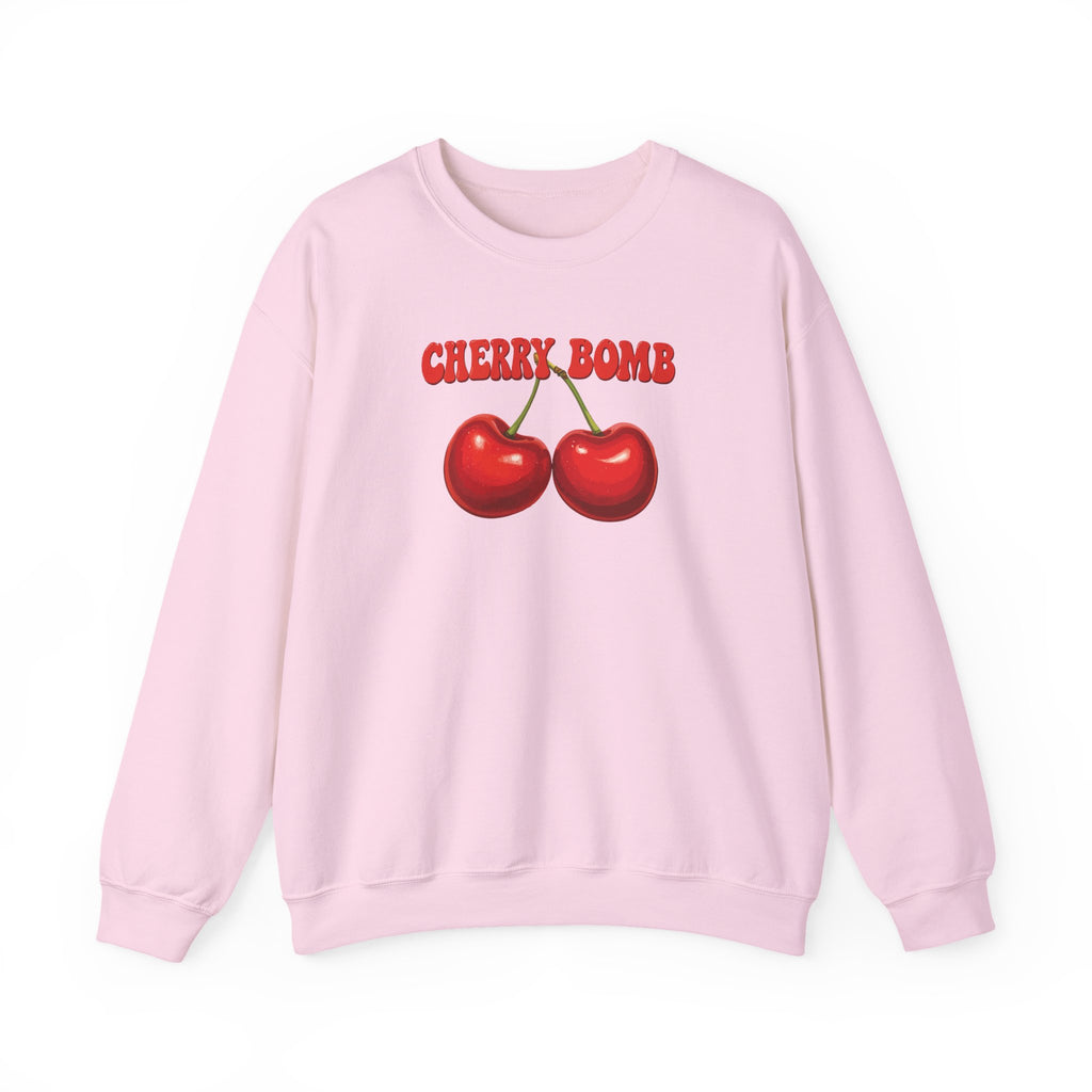 Pink sweatshirt with cherry design and 'CHERRY BOMB' text on a white background