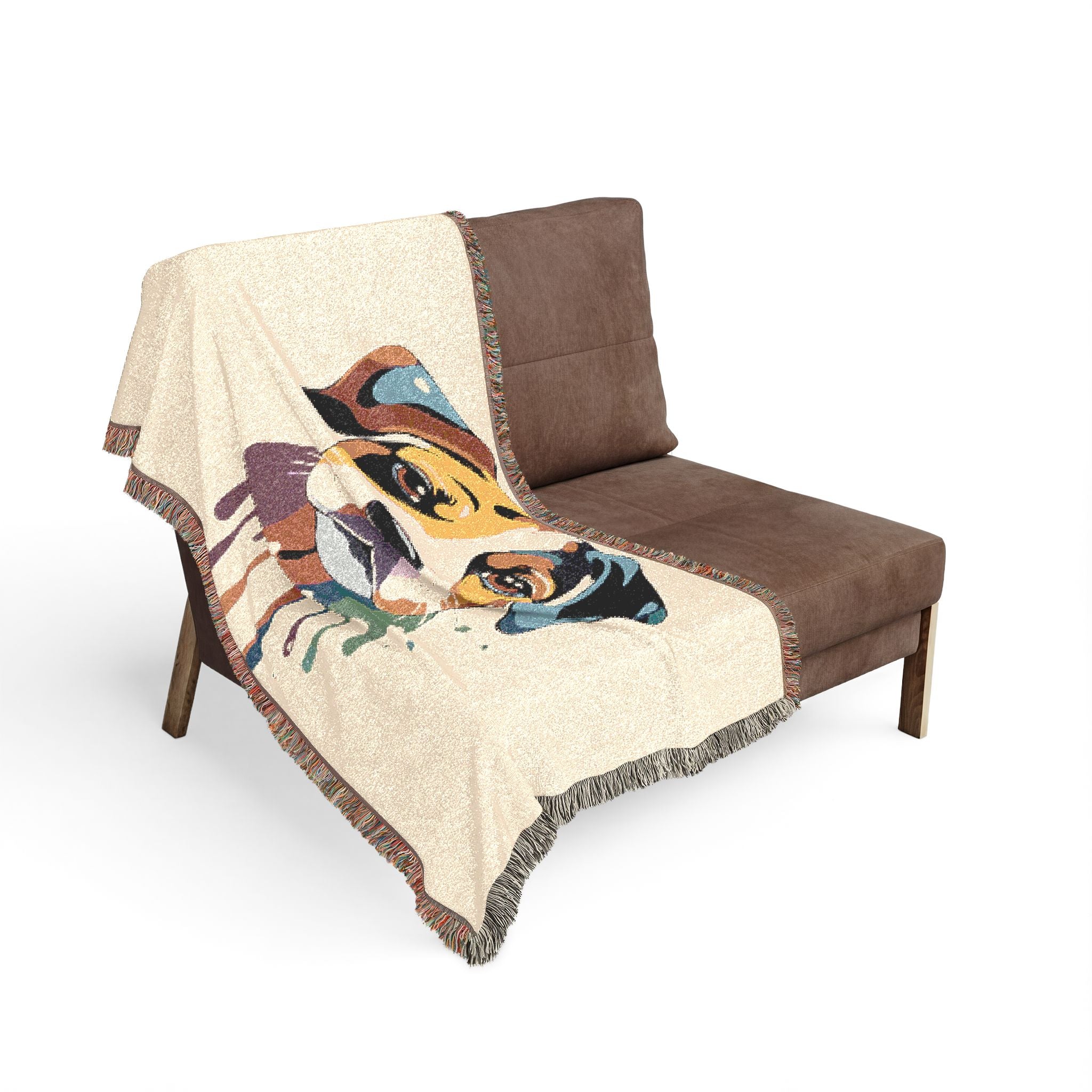Brown chair with a decorative blanket featuring dog illustrations on a white background