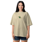 Woman wearing a beige t-shirt with a graphic design on a white background