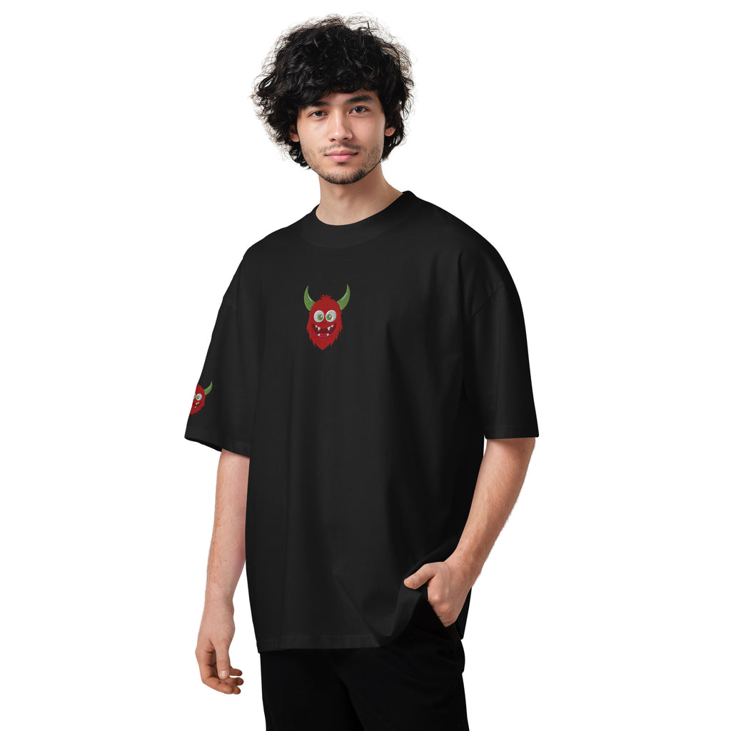 Person wearing a black t-shirt with a red and green graphic on a white background