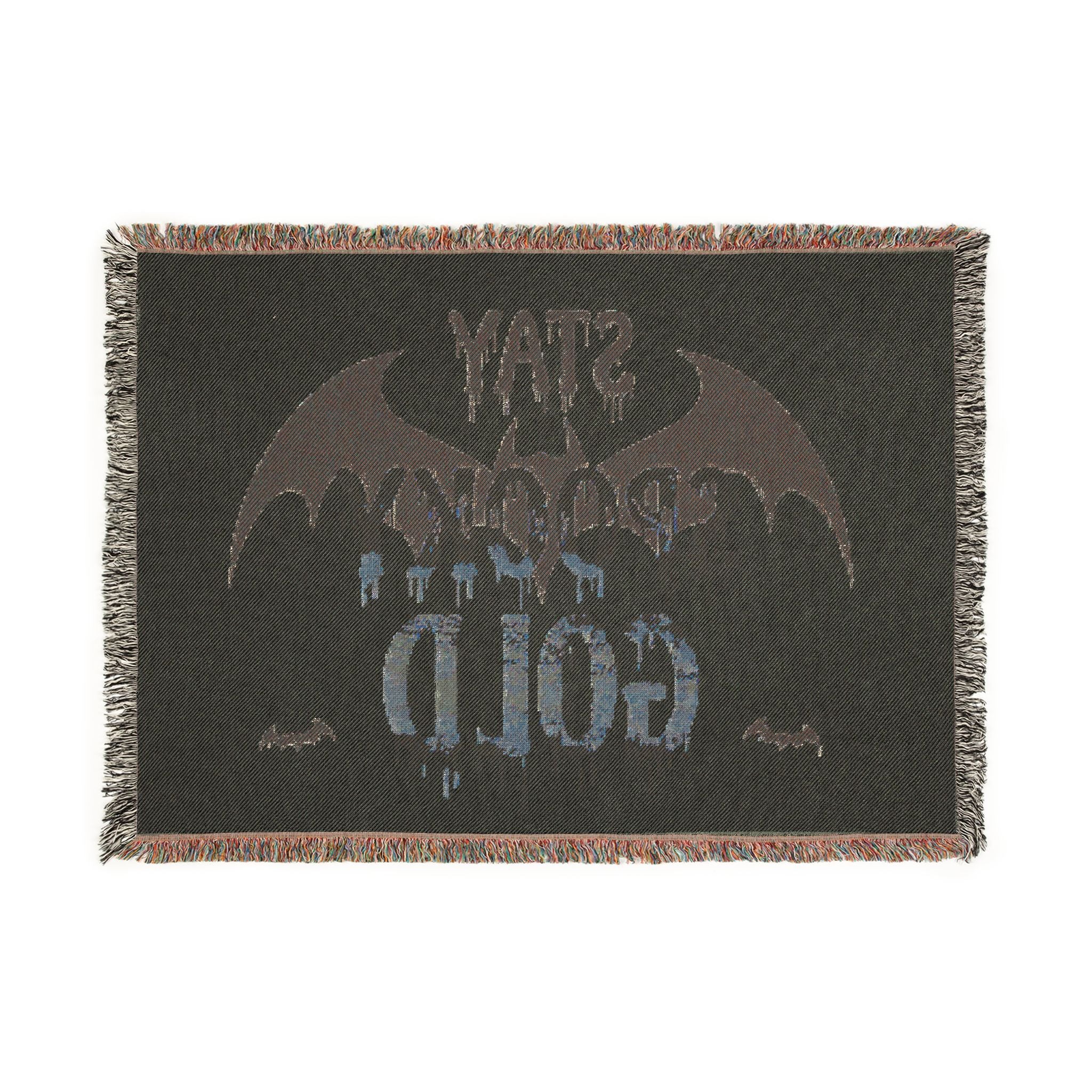 Textile with bat design and text on a black background