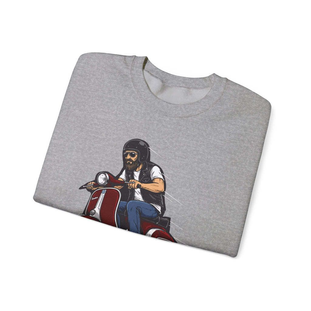 Folded gray t-shirt with a graphic of a person on a motorcycle on a white background