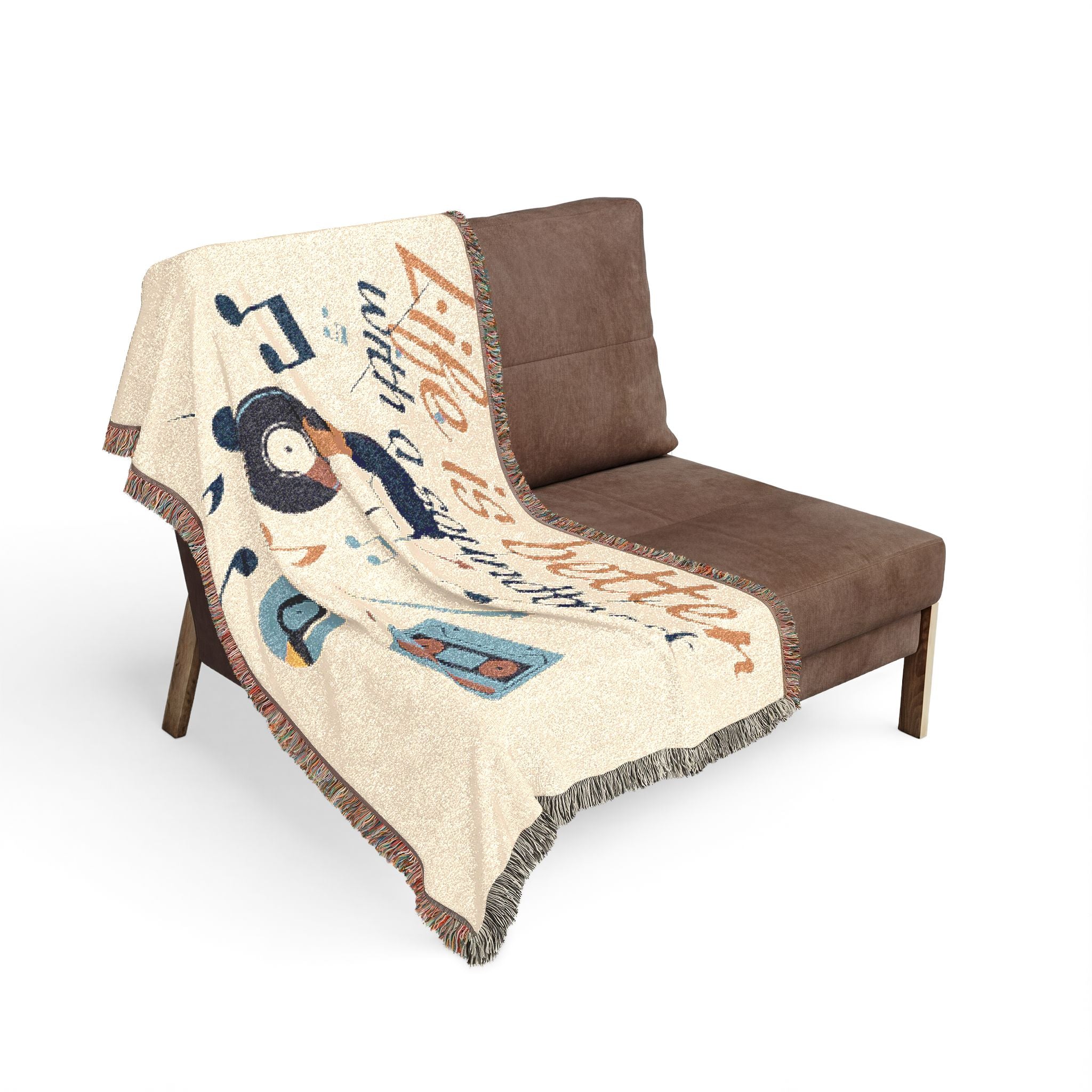 Decorative blanket with cartoon character on a brown chair against a white background