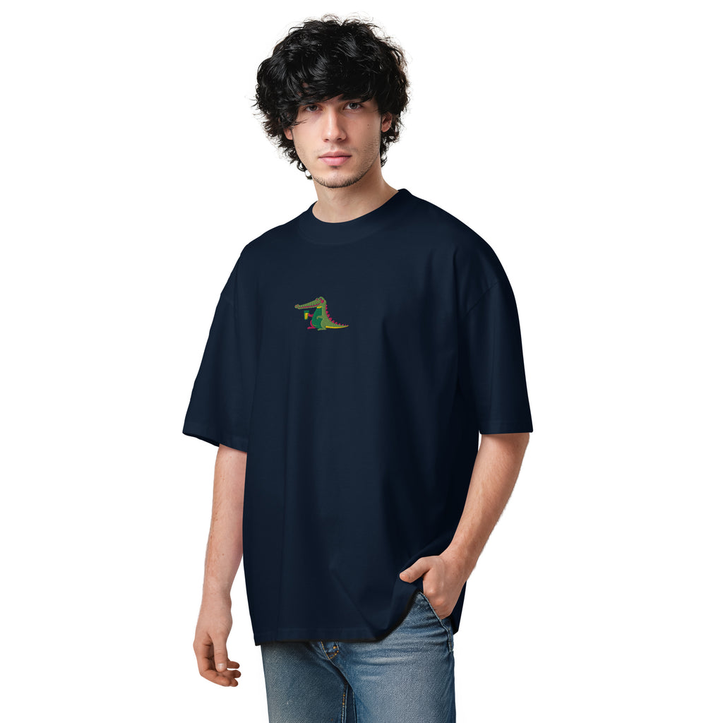 Person wearing a navy blue t-shirt with a small logo on a white background