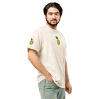 Man wearing a white t-shirt with lemon designs on a white background