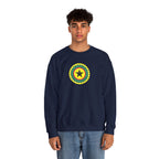 Person wearing a navy blue sweatshirt with a colorful circular design on a white background