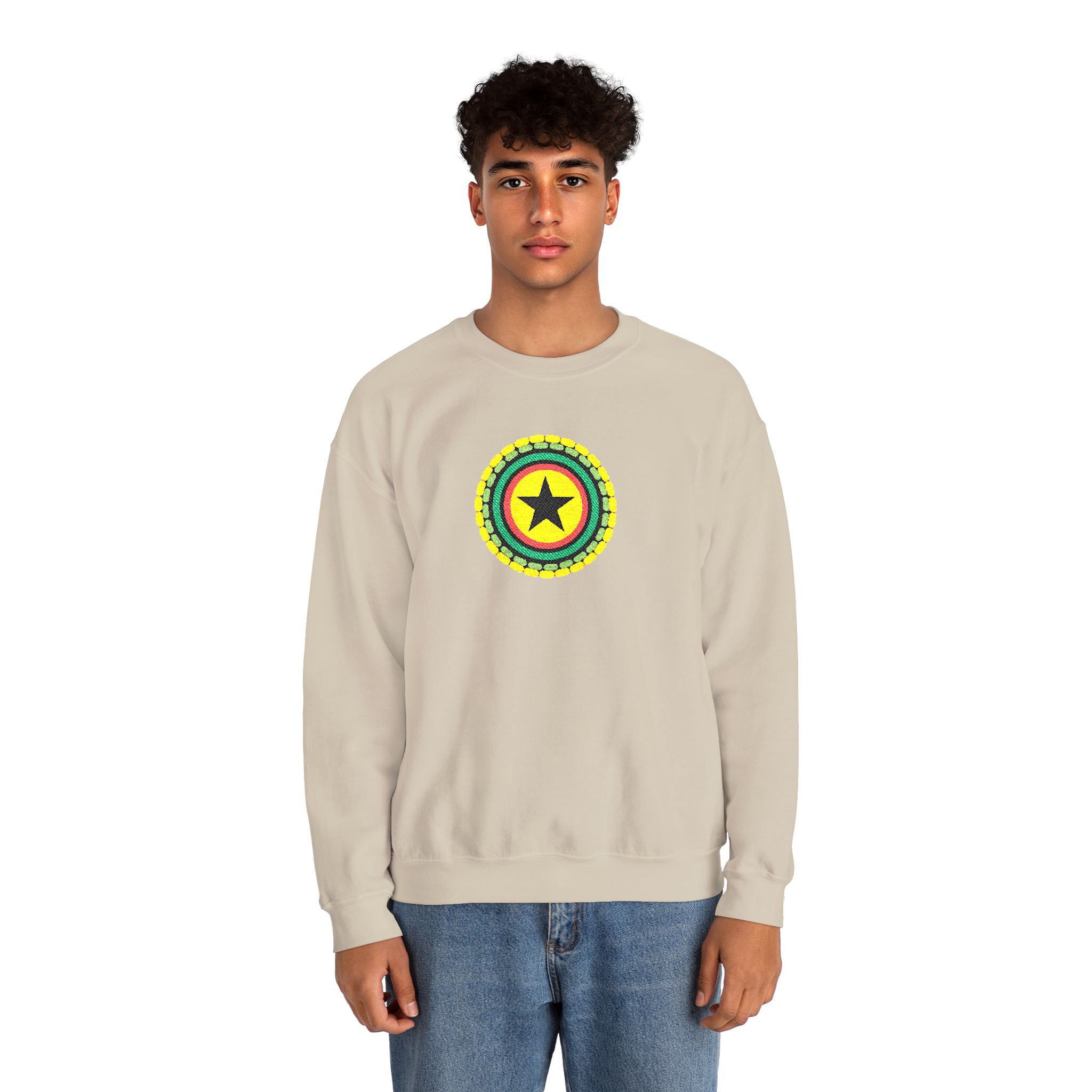Person wearing a beige sweatshirt with a graphic design on a white background