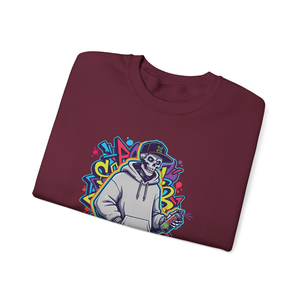 Folded maroon sweatshirt with colorful graphic design on a white background